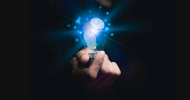 istock Businessman holding a light bulb, Creative new idea. Innovation, brainstorming, solution and inspiration concepts. imagination, creative thinking problem solving.. 1460245126