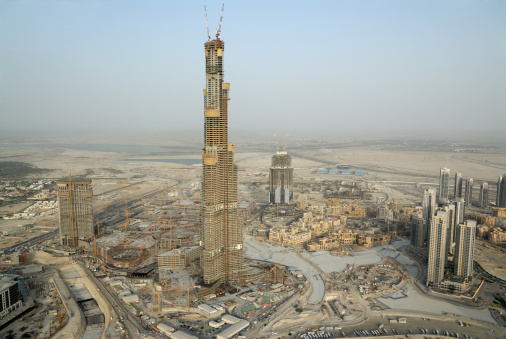 Construction & Property Development On A Massive Scale In The Middle East. The Tall Building Seen Here Is Burj Dubai Located In Business Bay Which Is Tallest Sky Scraper In The World