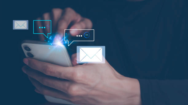 istock Businessman touching smartphone with open e-mail, receiving business e-mail news alerts Advertising by sending and customer messaging. online digital technology direct selling business, reminder. 1460248917