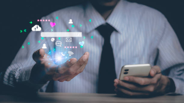 istock Businessman touching smartphone with open e-mail, receiving business e-mail news alerts Advertising by sending and customer messaging. online digital technology direct selling business, reminder. 1460248937