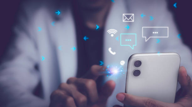 istock Businessman touching smartphone with open e-mail, receiving business e-mail news alerts Advertising by sending and customer messaging. online digital technology direct selling business, reminder. 1460248949