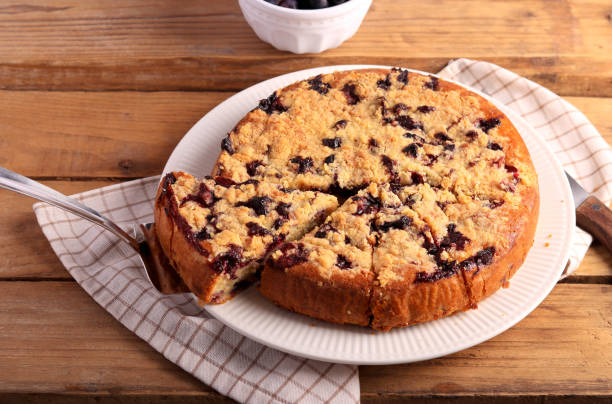 cake with berries and crumble topping
