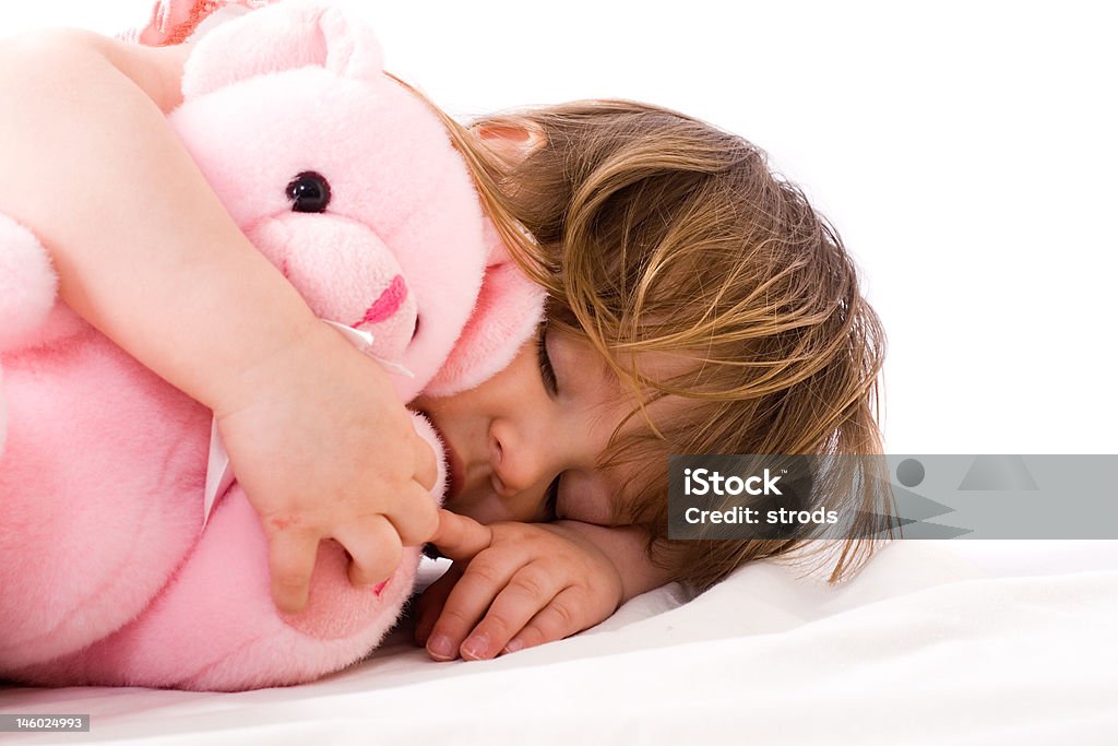Ragazza dorme con orsacchiotto - Foto stock royalty-free di Accessibilità