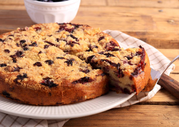 istock cake with berries and crumble topping 1460250057
