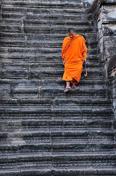 istock Cambodia monk in the stairs 146025151