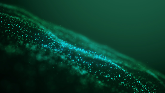 Glowing Green particle form on dark background abstract concept stock photo