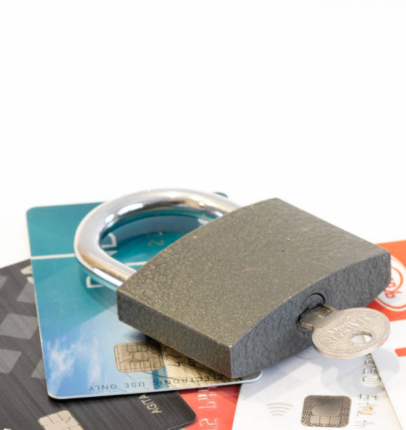 istock credit cards and padlock. 1460255878