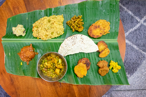 indian traditional mithila region food served at banana leaf at festival from different angle