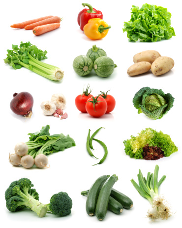 Different vegetables isolated over white.