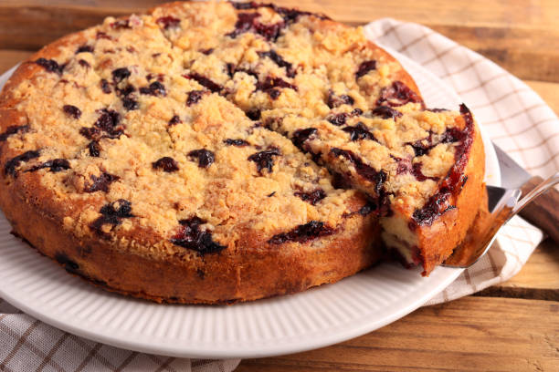 istock cake with berries and crumble topping 1460258486