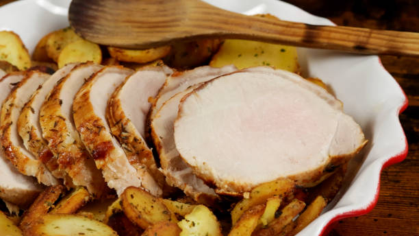 istock roast pork and sarladaise potatoes in a dish 1460259888