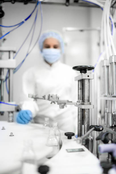 istock Pharmaceutical Bottle Manufacturing - Blowing, Filling, Capping and Labeling 1460261350