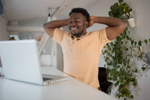 istock Young fashionable man working at home 1460262147