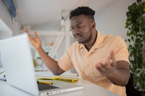 istock Young fashionable man working at home 1460262168