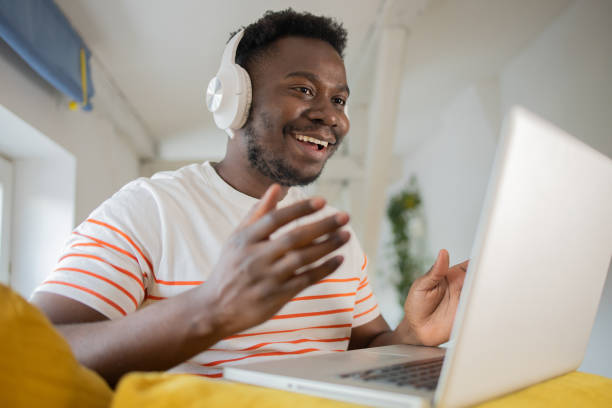 istock Young fashionable man working at home 1460262194