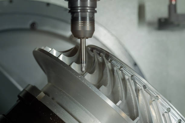 istock Close up: cnc turning milling machine cutting metal workpiece at factory 1460262557