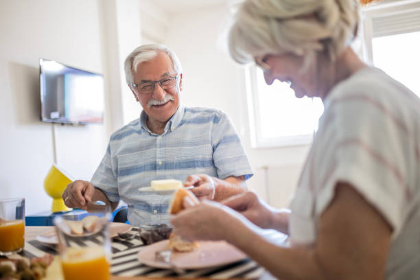 istock Happy senior couple eating breakfast 1460262806