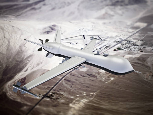 istock Autonomous unmanned attack drone flying over a military base among the mountains 1460264534