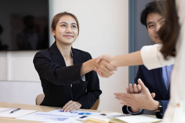 istock Handshake, Business partners meeting discussing cooperation agreements on business projects. Collaboration of people in the organization. 1460265474