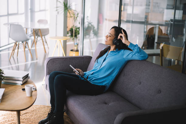 istock Happy black woman enjoying music during break 1460266191