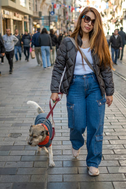 istock Beautiful woman enjoyment with her dog 1460271761