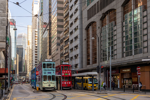 Hong Kong - January 27, 2023 : Des Voeux Road Central in Sheung Wan, Hong Kong. Des Voeux Road Central was named after the 10th Governor of Hong Kong, Sir William Des Vœux.