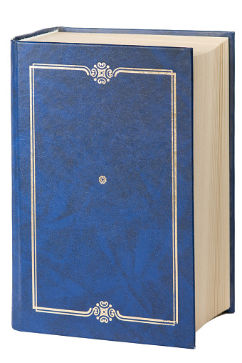 An old book with a blue cover on white