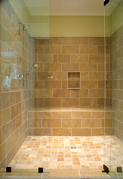 large stone and glass shower stock photo