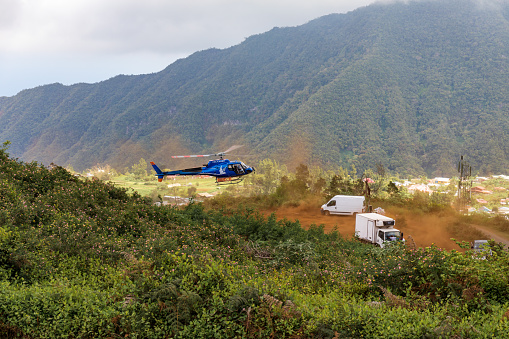 Reunion Island - Helicopter winching goods to Mafate cirque