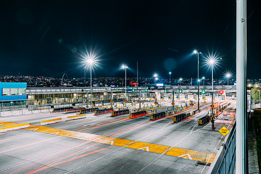 Drivers in lines of Traffic Cars Crossing the US-Mexico border from San Diego, California, US into Tijuana, Mexico at San Ysidro Border Point of Entry