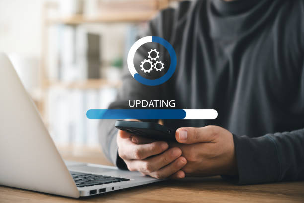 istock Operating system upgrade concept, installation and update process, modernize your equipment, and update functions in the new version, Improved security. 1460275888