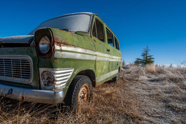 istock Bottom perspective view of abandoned green old van 1460277894