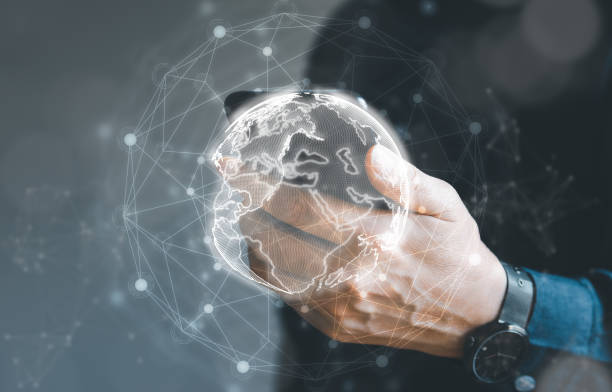 istock Businessman using mobile or smart phone to connect global business 1460278248