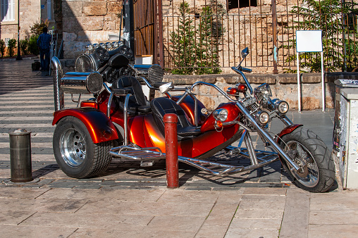 Parked three-wheeled motorcycle