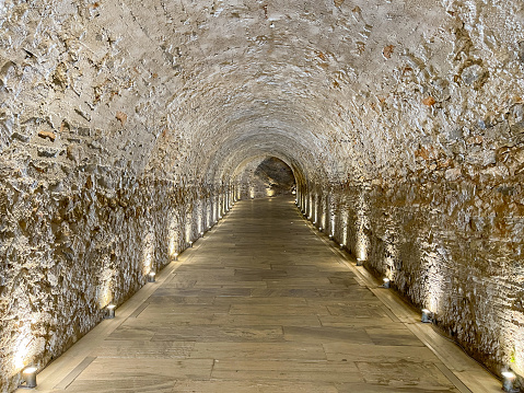 Athens, Greece - May 2022: Floodlit tunnel inside the historic Olympic Stadium in Athens