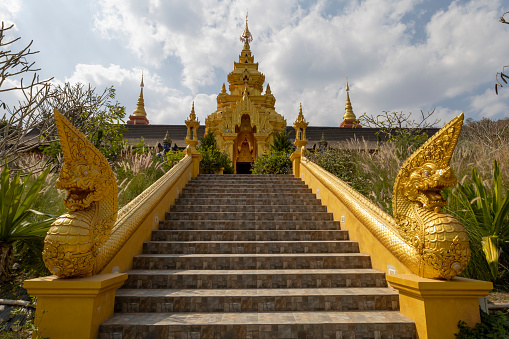 Landmark Sunrise with sky at Wat Phra That Doi Phra Chan on the top hill of Doi Phra Chan mountain in Mae Tha, Lampang, Thailand