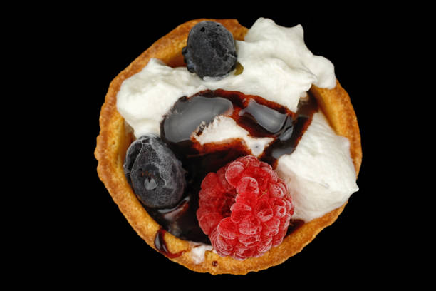 Dessert basket with berries and cream. Top view