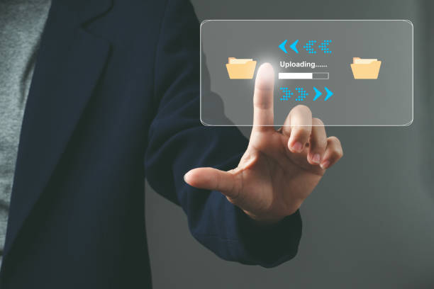 istock businessman upload documents from computer to backup online cloud and download copy file data from cloud network for make work in office or from home. download and upload document for business concept 1460295292