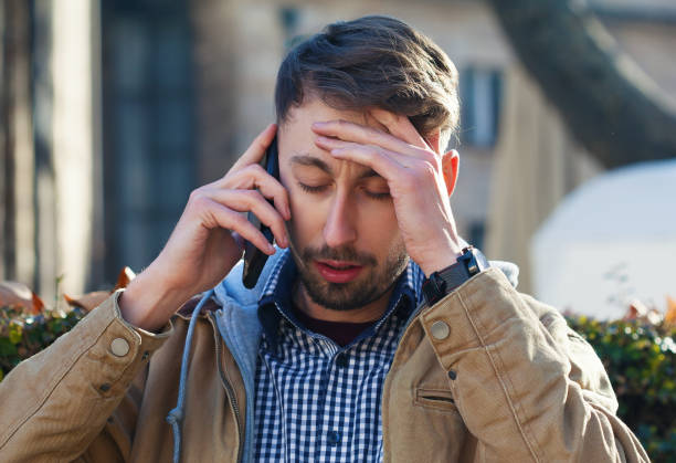 istock Young man hearing bad news 1460297220