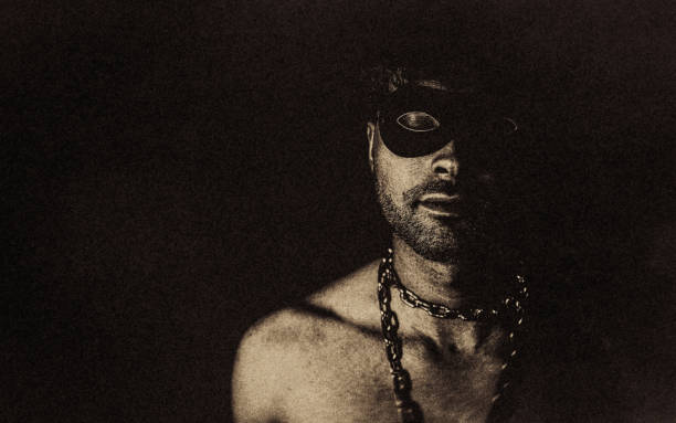 istock The man with the eye mask. 1460302592