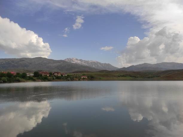istock Lake with the mountain 1460305107
