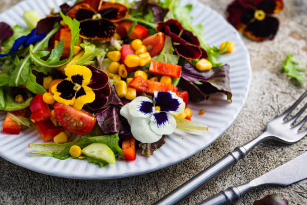 istock Vegetable salad with edible flowers 1460305978