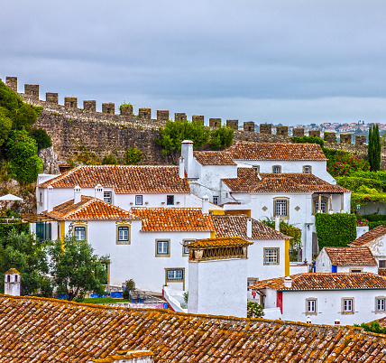 Old town Obidos houses and ancient fortress wall, Portugal