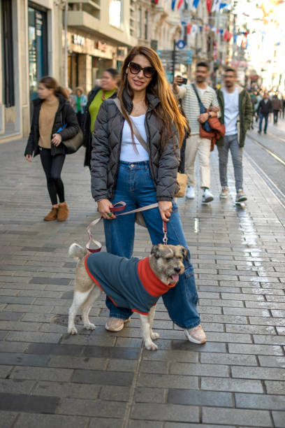 istock Beautiful woman enjoyment with her dog 1460307941