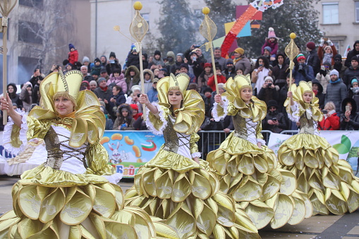 Pernik, Bulgaria - January 28, 2023: International masquerade festival Surva in Pernik, Bulgaria. People with mask called Kukeri dance and perform to scare the evil spirits