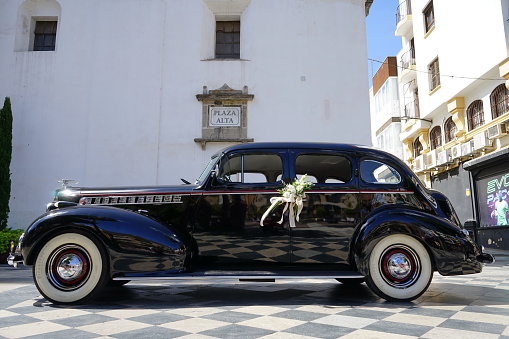 Wedding car in front of the church of Nuestra Señora de la Palma, in the city of Algeciras. Algeciras, Cadiz, Andalucia, Spain 10/01/2022