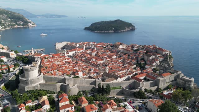 Dubrovnik Croatia UNESCO walled city panning high angle drone aerial view