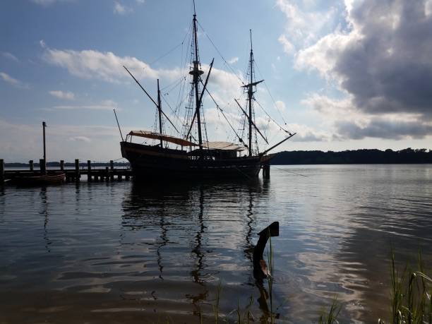 istock old boat docked on river or lake water with old anchor 1460311861