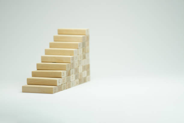 istock Stairs of wooden bricks on white background copy space. Concept for growth 1460316310