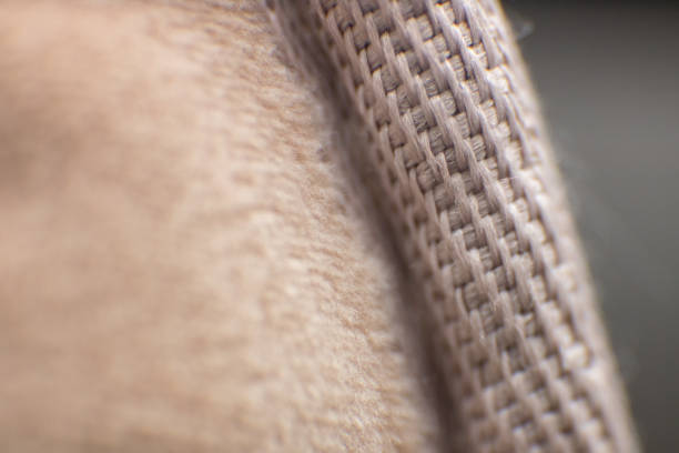 Abstract textured background image made in close-up of a fabric. Selective focus.